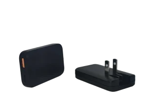 A 65W Ultra thin GaN Charger with Foldable Prongs Dual USB A C Ports PD 3.0 Fast Charging